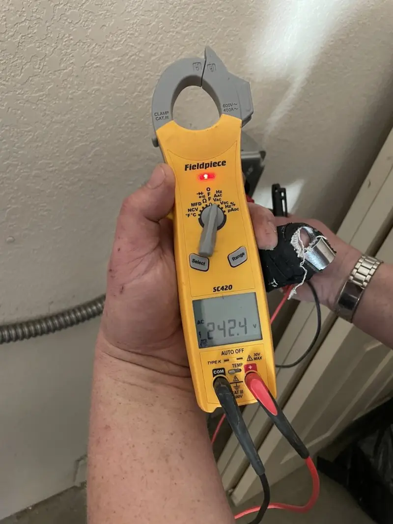 Voltage testing with clamp meter during Hot Tub / Pool Electrical Wiring in Limerick